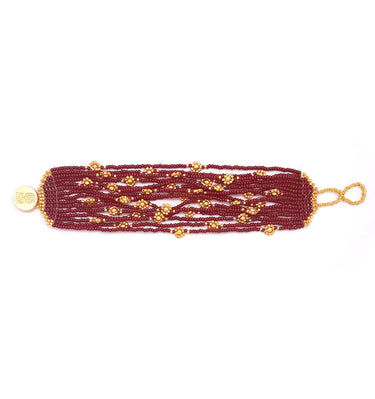 Brazalete cosecha 15 hilos dorado.